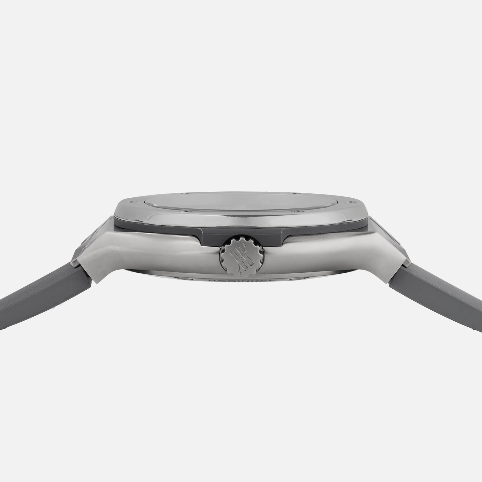 Side view of the Hublot Classic Fusion Titanium Limited Edition for Hodinkee wristwatch, displaying its bezel, crown, and case with straps attached, set against a plain white background.