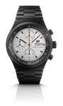 The Porsche Design Chronograph 1 F.A.T 2025 Edition features a black metal case, white dial with black markers, three subdials, and a red second hand.