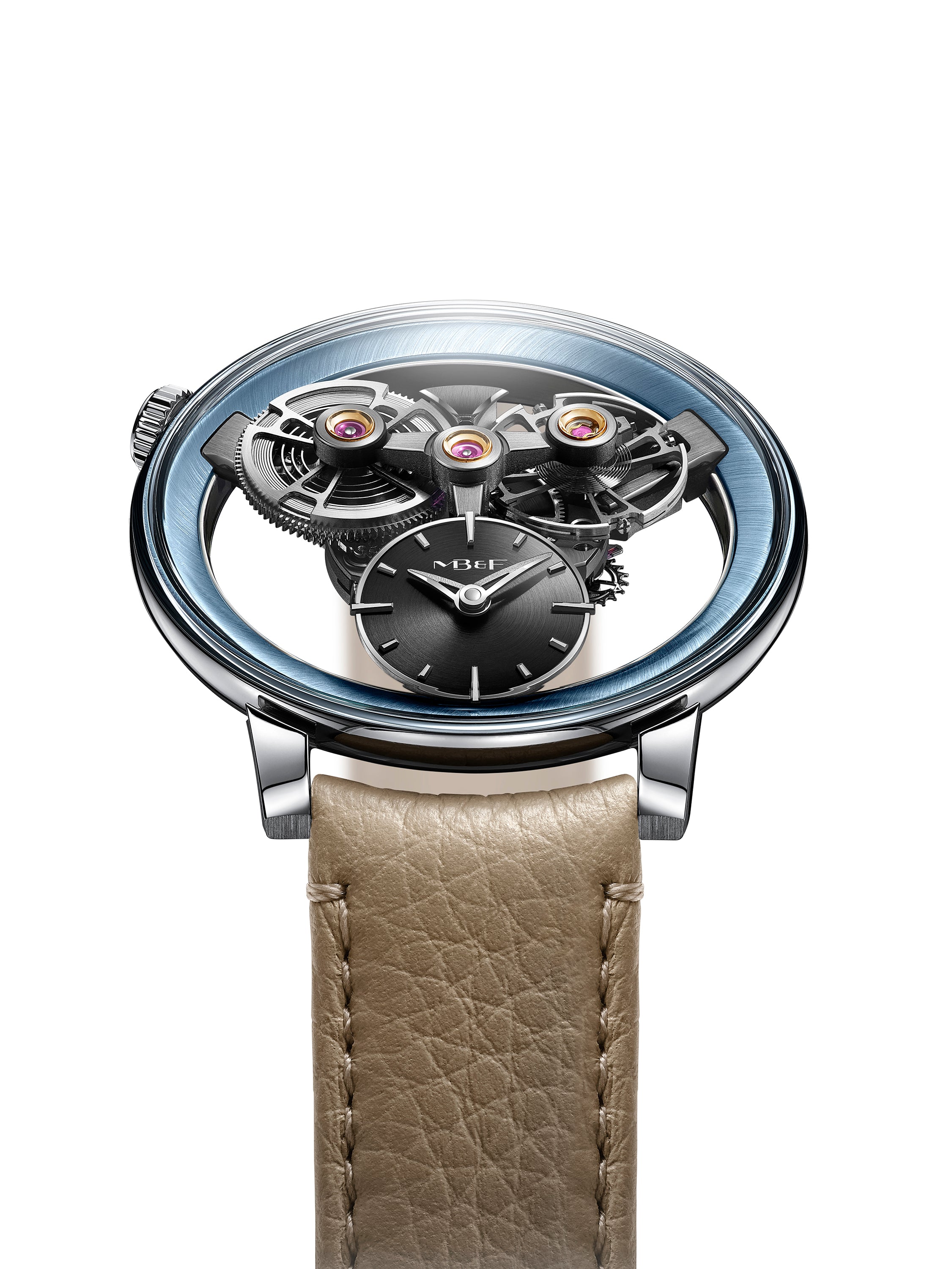 The MB&F SP One Platinum is a luxury watch featuring exposed gears, a blue rim, small black dial, and tan leather strap displayed on a white background.