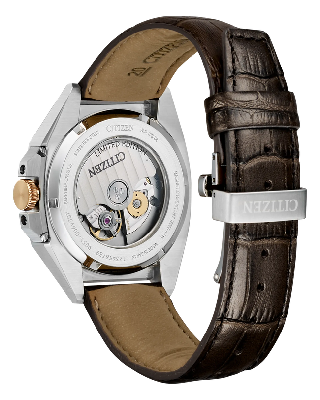 Stainless steel automatic watch with 40mm case, brown leather strap, visible movement, and two-tone bezel.