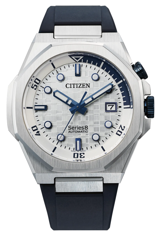 White stainless steel Citizen Series8 watch with blue hands and hour markers, date window, and black rubber strap.
