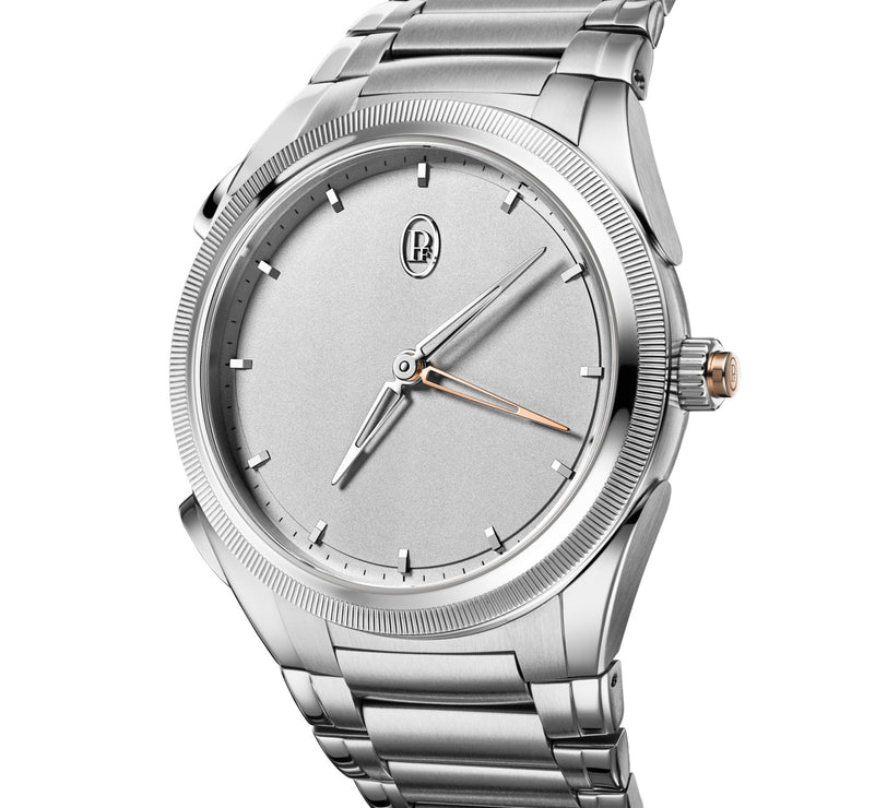 Silver watch with a detailed face on a white background