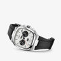 Glashütte Original Seventies Chronograph Panorama Date: a silver watch featuring a white dial, black subdials, and a black rubber strap, displayed on a white background.