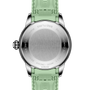 Back of a Breitling Superocean Heritage Automatic 36, featuring a mint green rubber strap and engraved stainless steel case back.