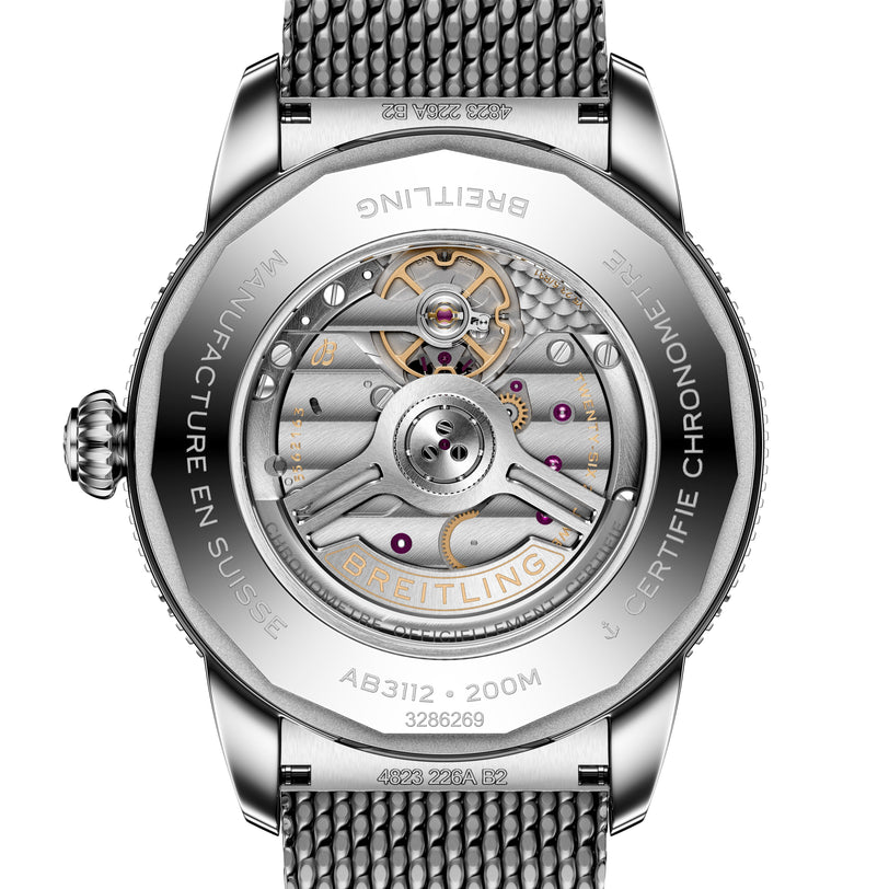 Close-up of a Breitling Superocean Heritage B31 Automatic 44 watch back, highlighting its exposed mechanical movement and engraved details.