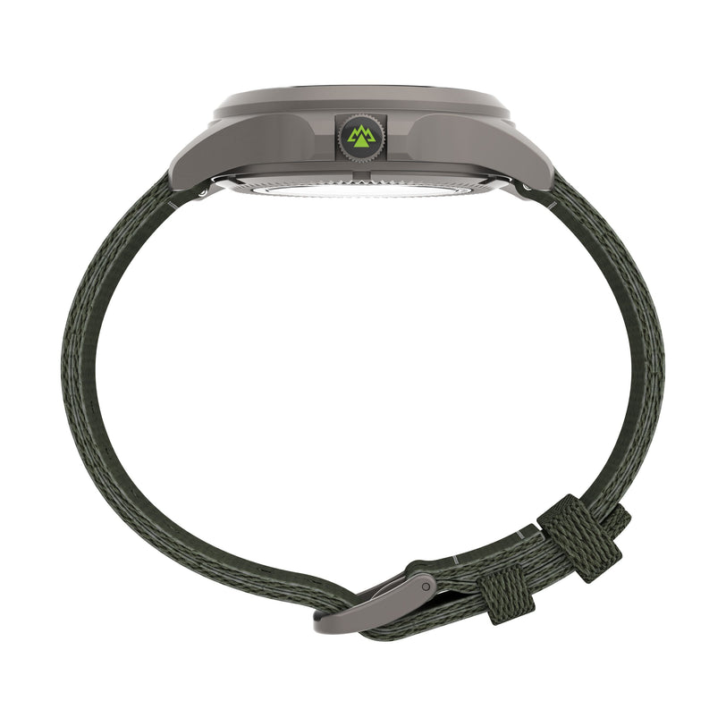 Side view of the Timex Expedition Titanium Automatic wristwatch, featuring a gray titanium case, dark green textured strap with matching buckle, and a subtle mountain logo on the side.