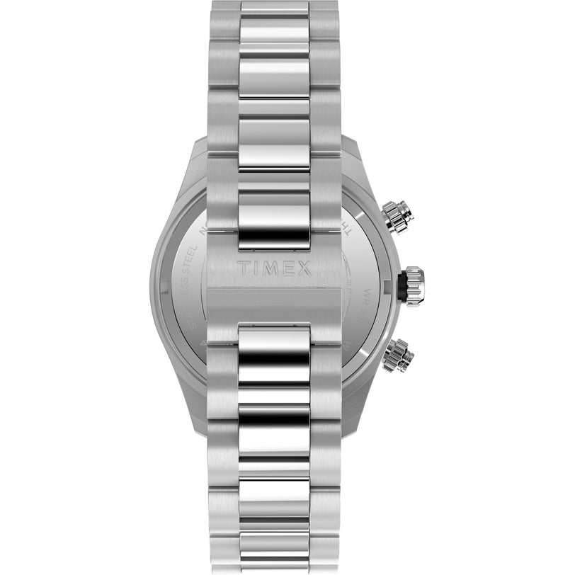 A close-up of the Timex Waterbury Heritage Chronograph highlights its stainless-steel bracelet, clasp, engraved back cover, and dual adjustment knobs.