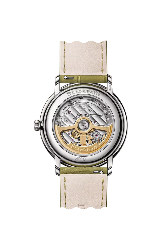 Silver-tone watch with cream leather strap, visible mechanical movement through transparent caseback, and gold-tone accents.