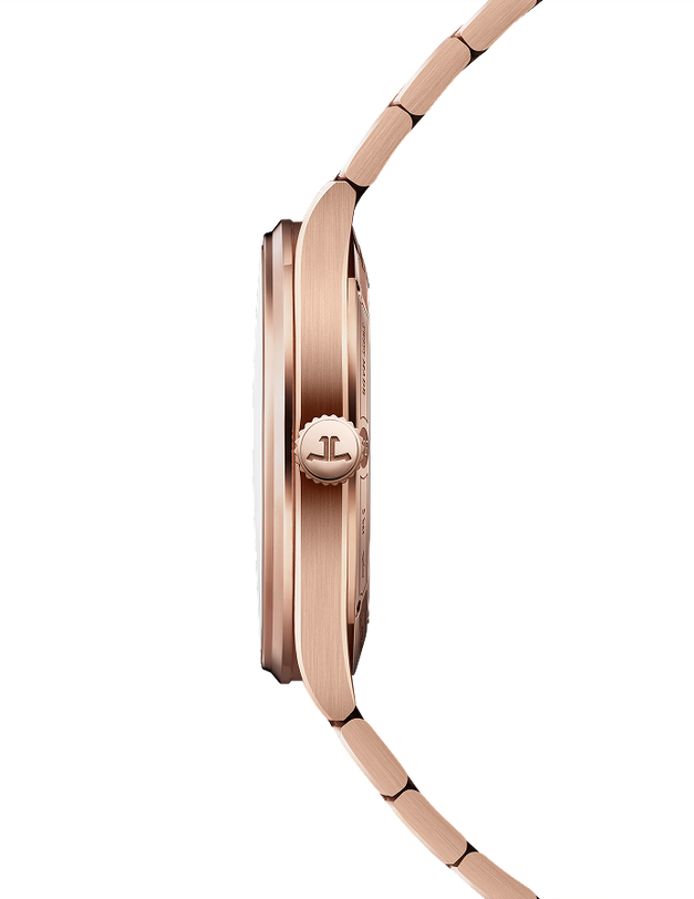 Gold men's watch with brushed case, linked bracelet, and crown with logo visible on side profile.