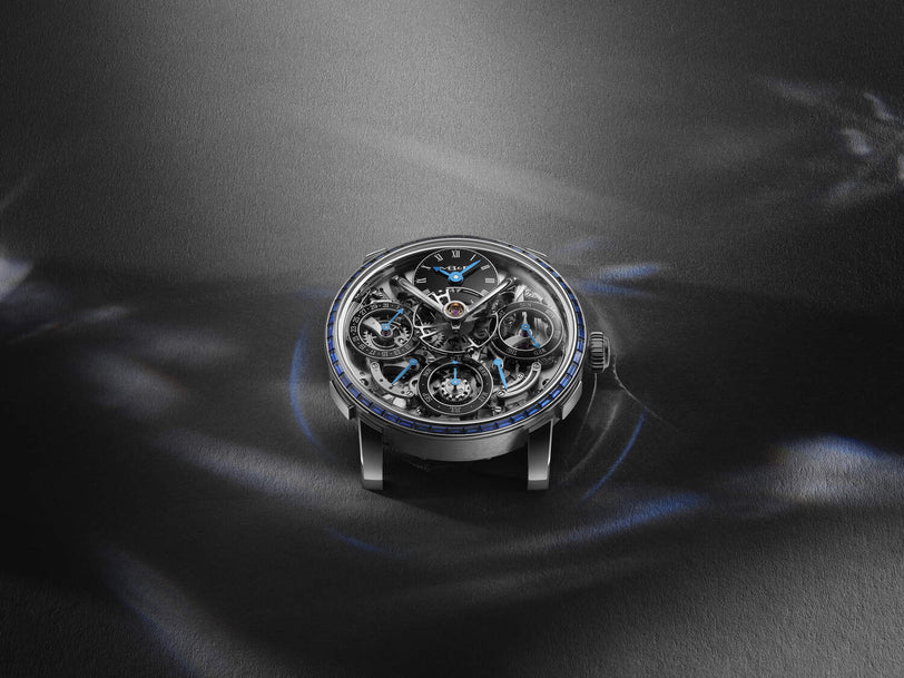 Luxury watch with intricate design on a dark background