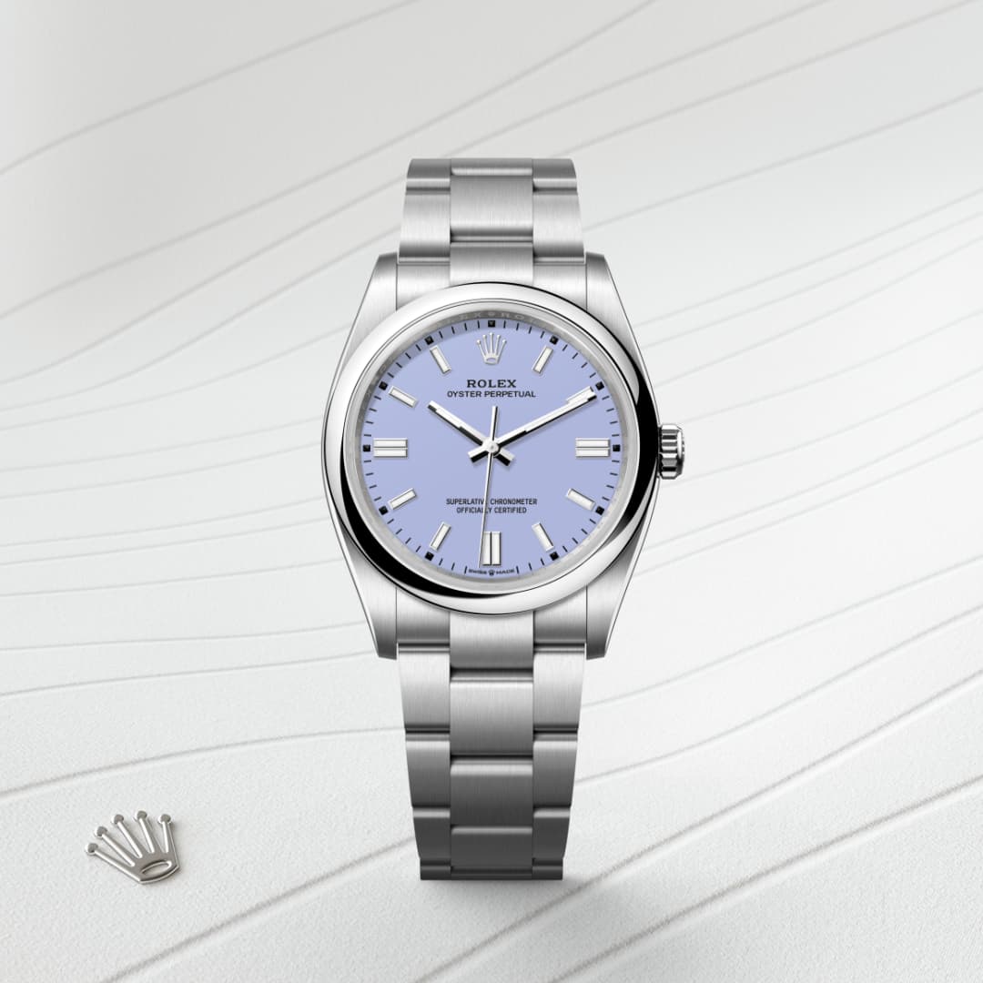 A silver Rolex watch with a light blue dial on a textured white background.