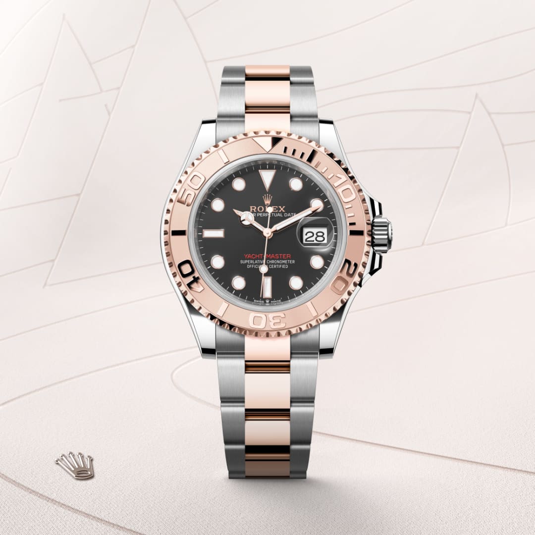 A Rolex Yacht-Master watch with a black dial and two-tone silver and rose gold bracelet, displayed on a light background.