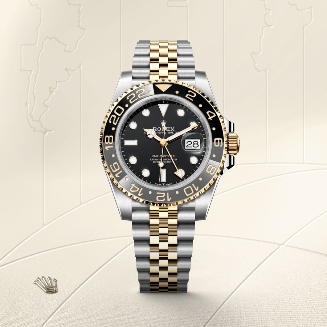 A Rolex two-tone watch with a black bezel and date display, on a light textured background with a crown logo.