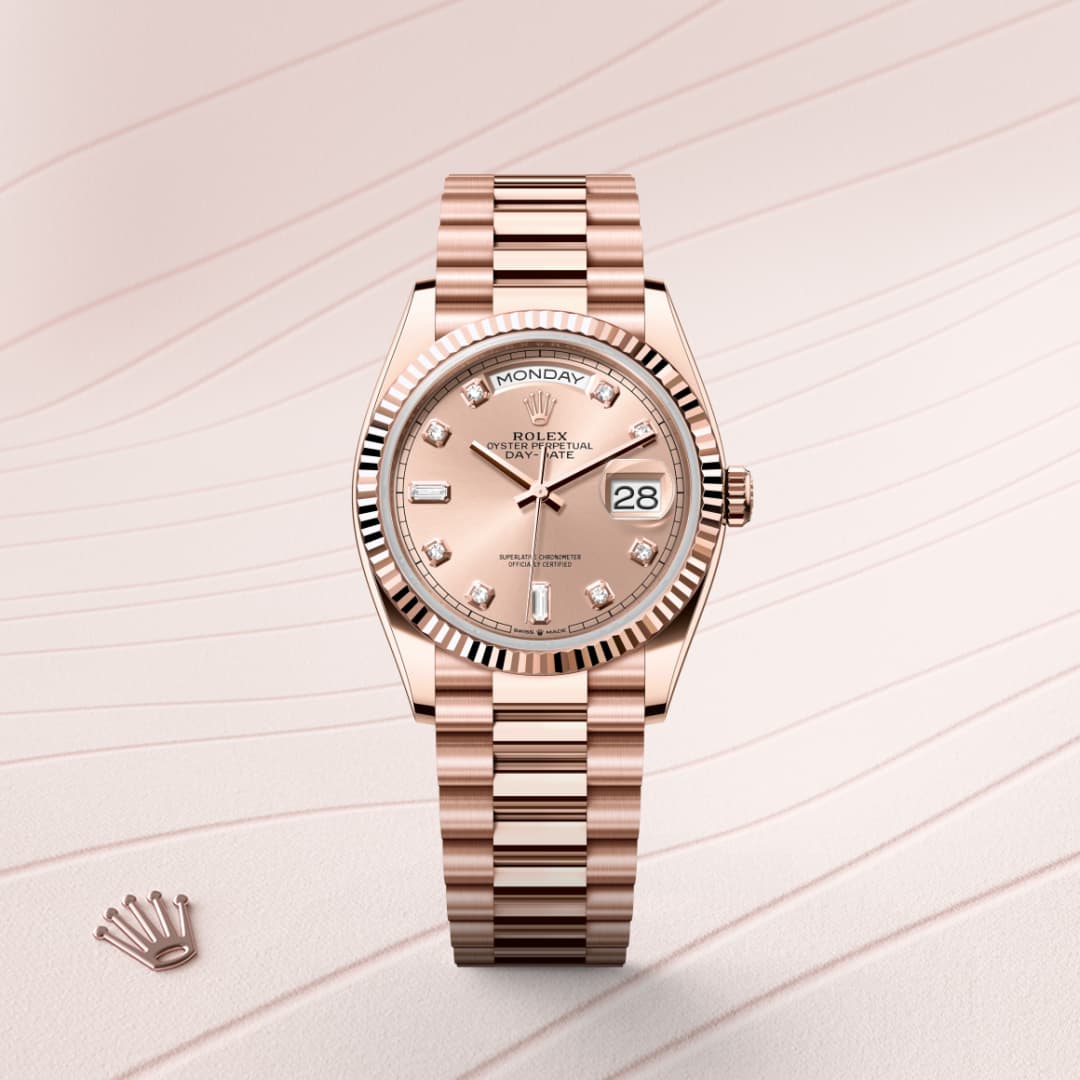 A rose gold Rolex watch with a diamond-studded dial and date display on a matching metallic bracelet.