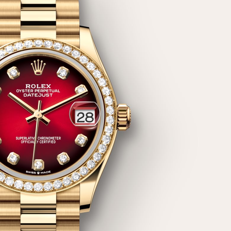 Gold Rolex Datejust watch with a red gradient face, diamond hour markers, and a diamond bezel.
