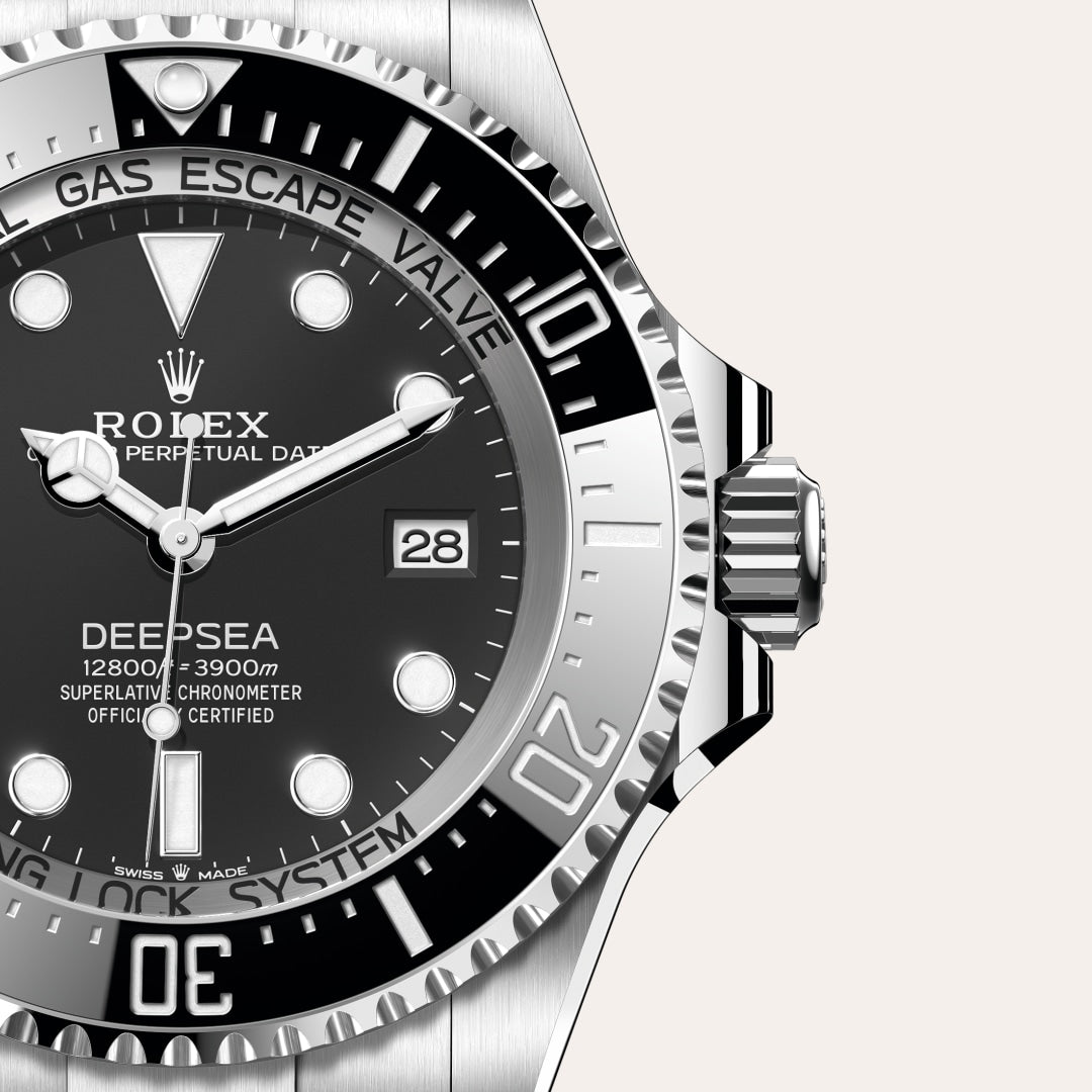 Close-up of a Rolex Deepsea watch face, showing the date and details of the bezel and crown.