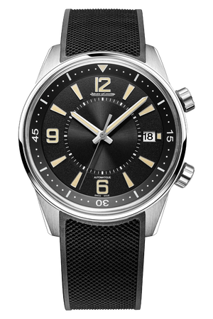 The Jaeger-LeCoultre Polaris Date is a black and silver luxury watch with a textured strap, round black dial, white hour markers, date at 3 o’clock, and two crowns. Time is set to 10:10. Inspired by the iconic Calibre 899 movement.