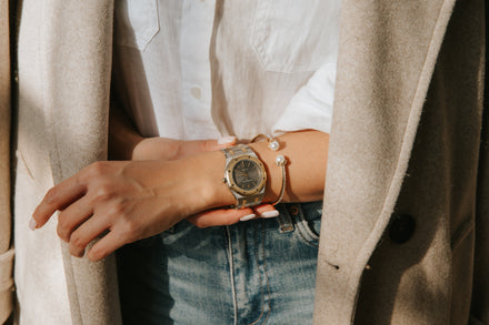 Two-tone gold and silver vintage watch on a woman's wrist