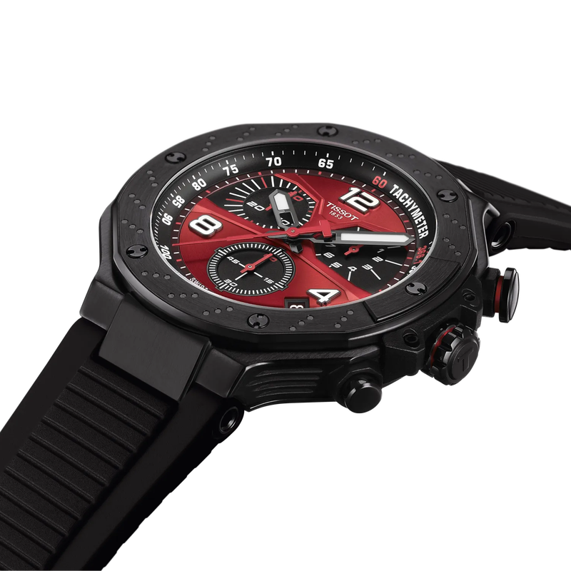 Black and red watch with detailed face on a white background
