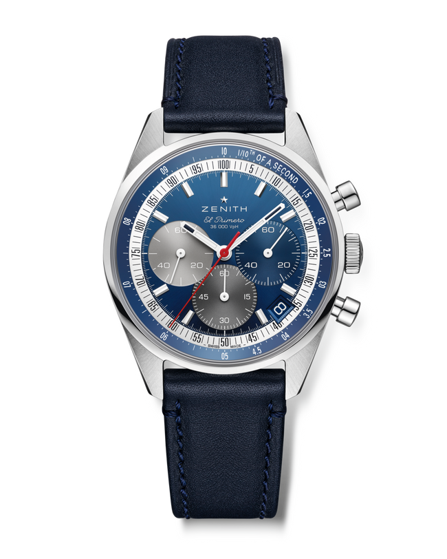 The Zenith Chronomaster Original is a chronograph wristwatch featuring a blue dial, silver subdials, and a blue leather strap.
