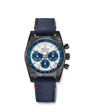 Luxury watch with blue strap and detailed face on a white background
