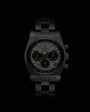 Black watch with green accents on a black background