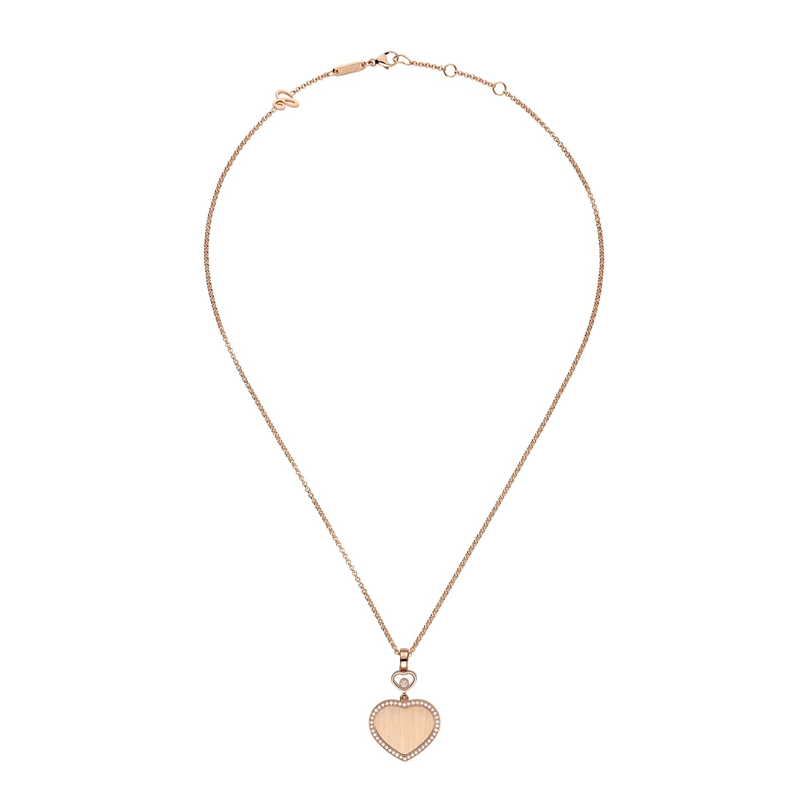 The Chopard Happy Hearts limited-edition gold necklace features a thin chain and a heart-shaped pendant outlined with sparkling crystals.