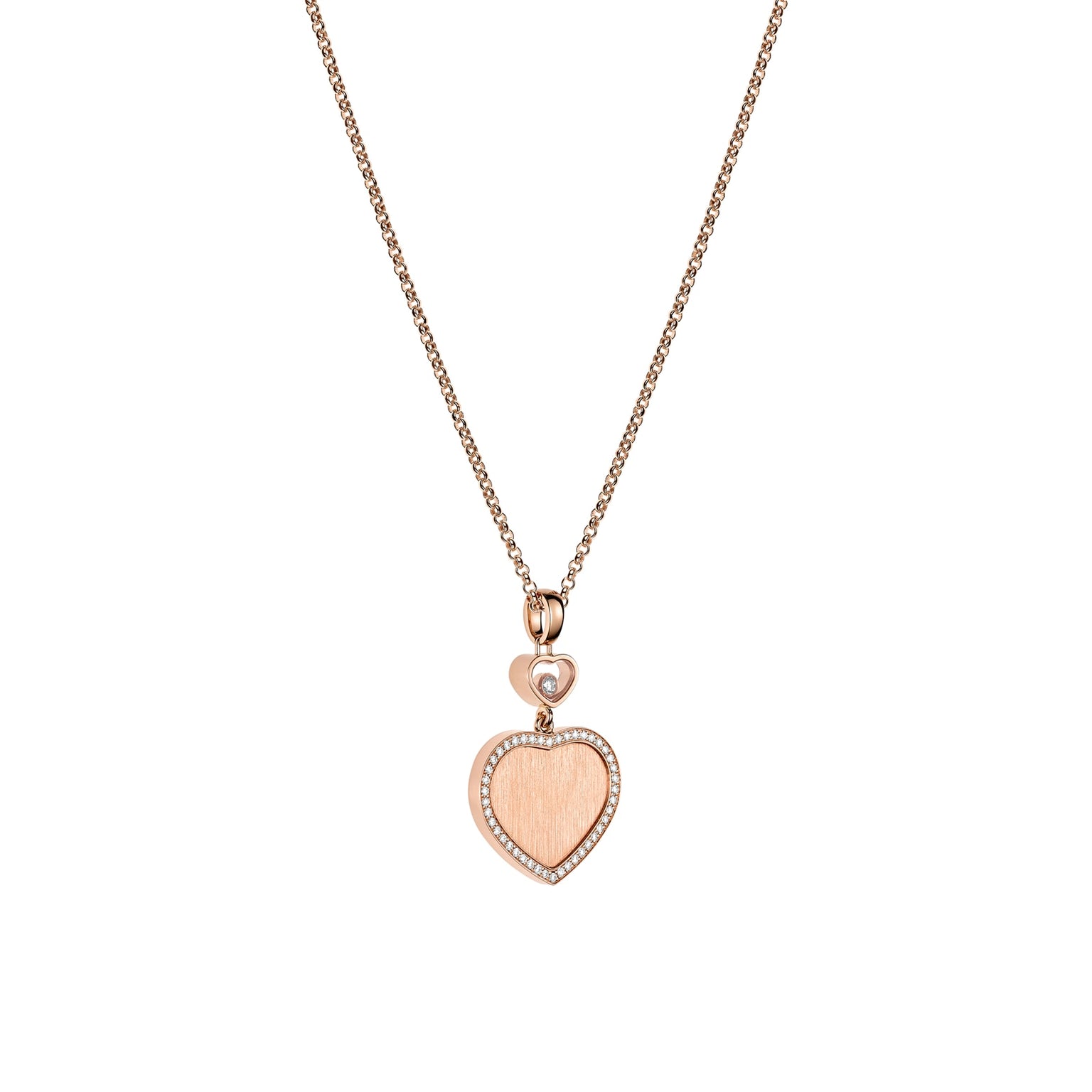 The Happy Hearts necklace by Chopard is a limited-edition gold piece featuring a heart-shaped pendant outlined with small stones and a single round accent above the heart.