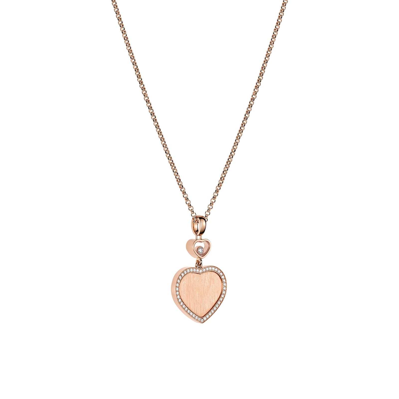 The Happy Hearts necklace by Chopard is a limited-edition gold piece featuring a heart-shaped pendant outlined with small stones and a single round accent above the heart.