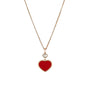 The Chopard Happy Hearts necklace features a red heart-shaped pendant in 18ct rose gold with a floating diamond above the heart.