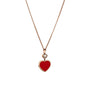 The Chopard Happy Hearts necklace in 18ct rose gold showcases a red heart-shaped pendant with a floating diamond and a delicate heart outline above, elegantly set against a white background.