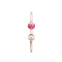 The Chopard Happy Diamonds Planet bangle features a pink marbled bead and a small round gem in rose gold, inspired by Happy Diamonds designs, shown on a white background.