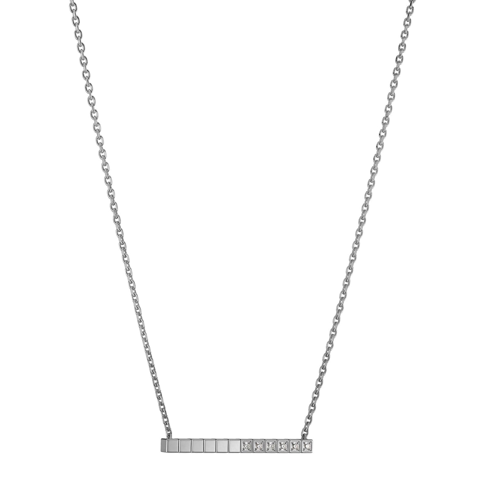 The Chopard Ice Cube necklace in 18ct white gold features a horizontal rectangular pendant with square segments, some set with clear stones—offering a modern, minimalist twist on the classic diamond pendant.