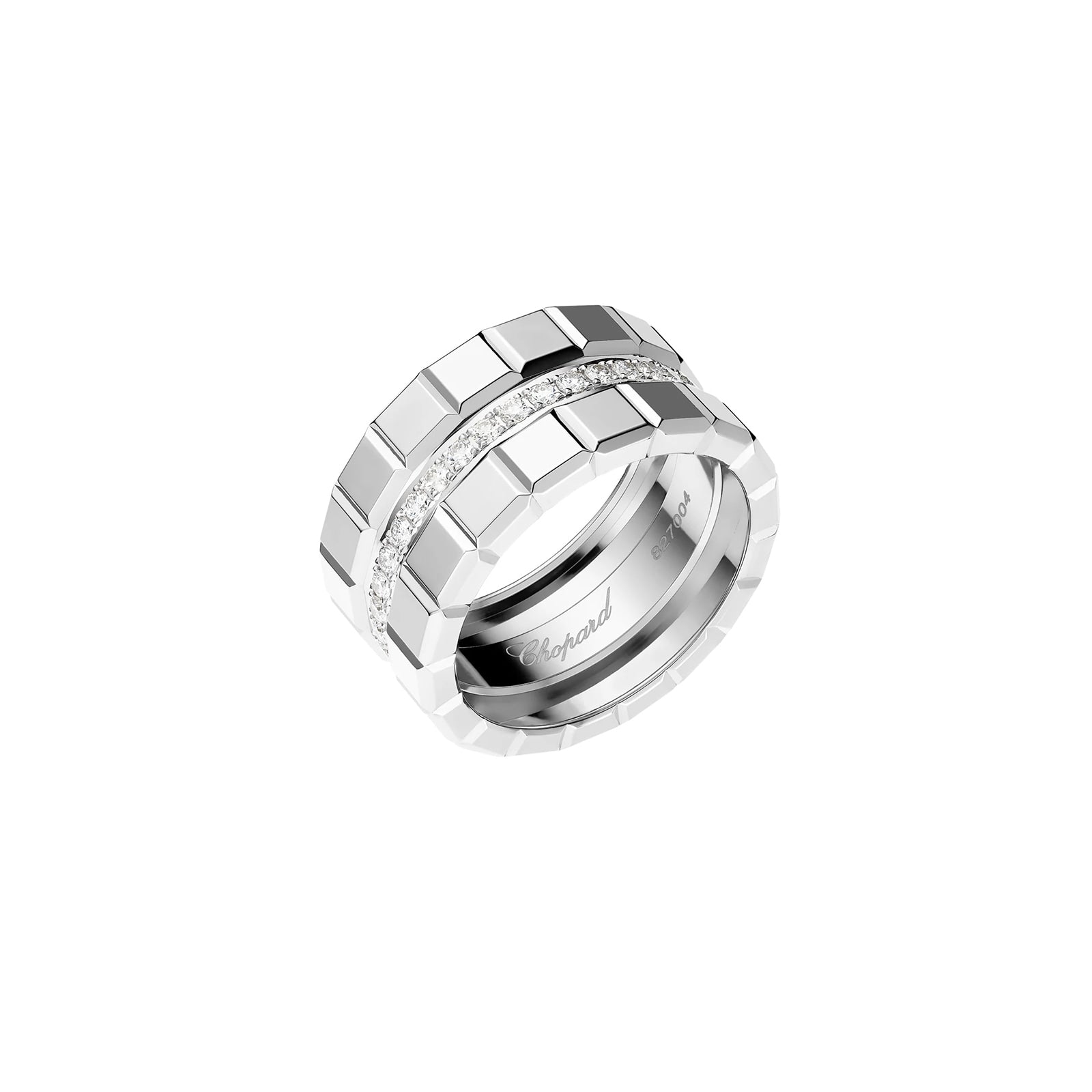 The Chopard Ice Cube ring features a silver geometric design with a row of central diamonds for minimalist elegance, engraved with the Chopard name inside.
