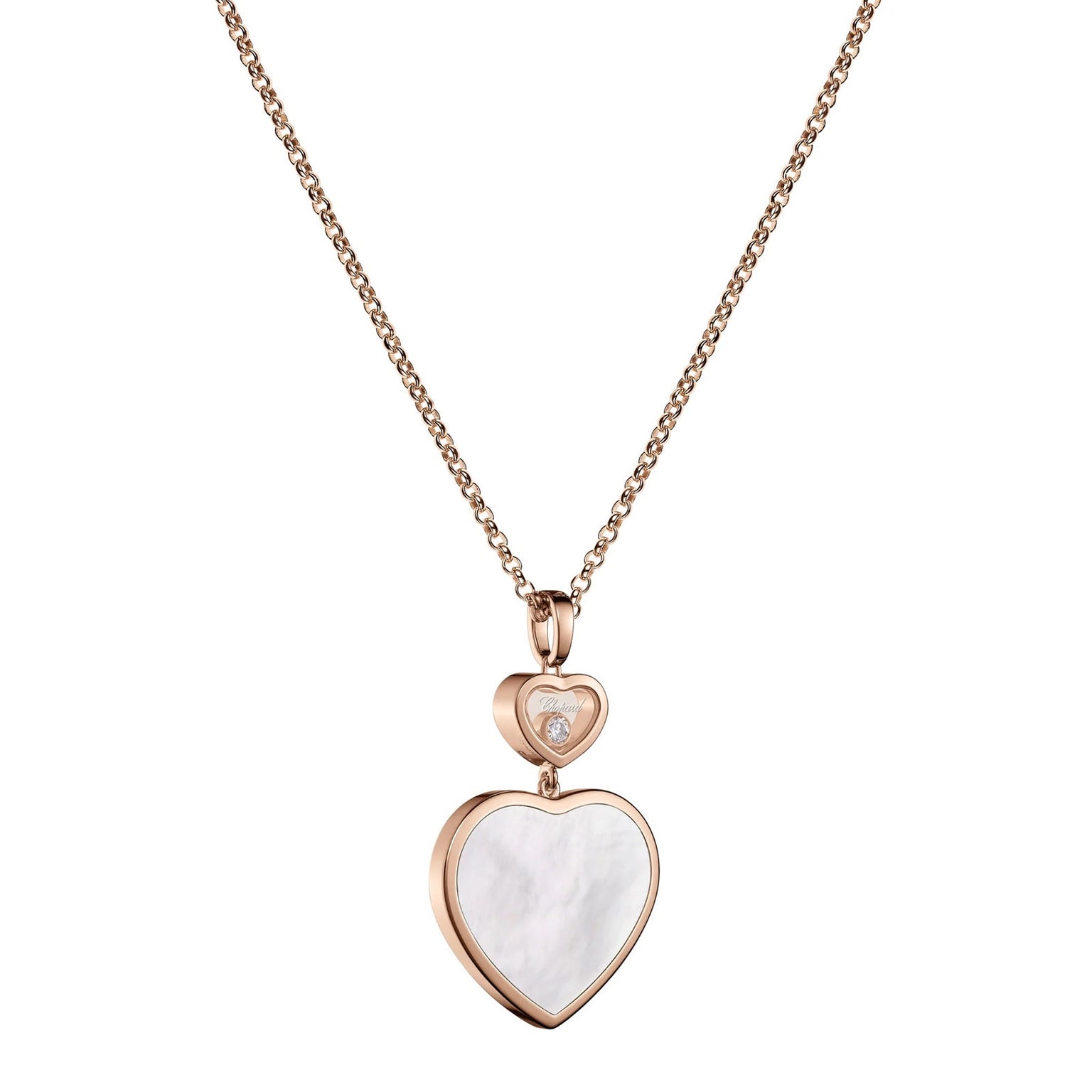 The Chopard Happy Hearts necklace features a rose gold double heart pendant with a small diamond in the top heart and a larger white mother-of-pearl inlay in the bottom heart.