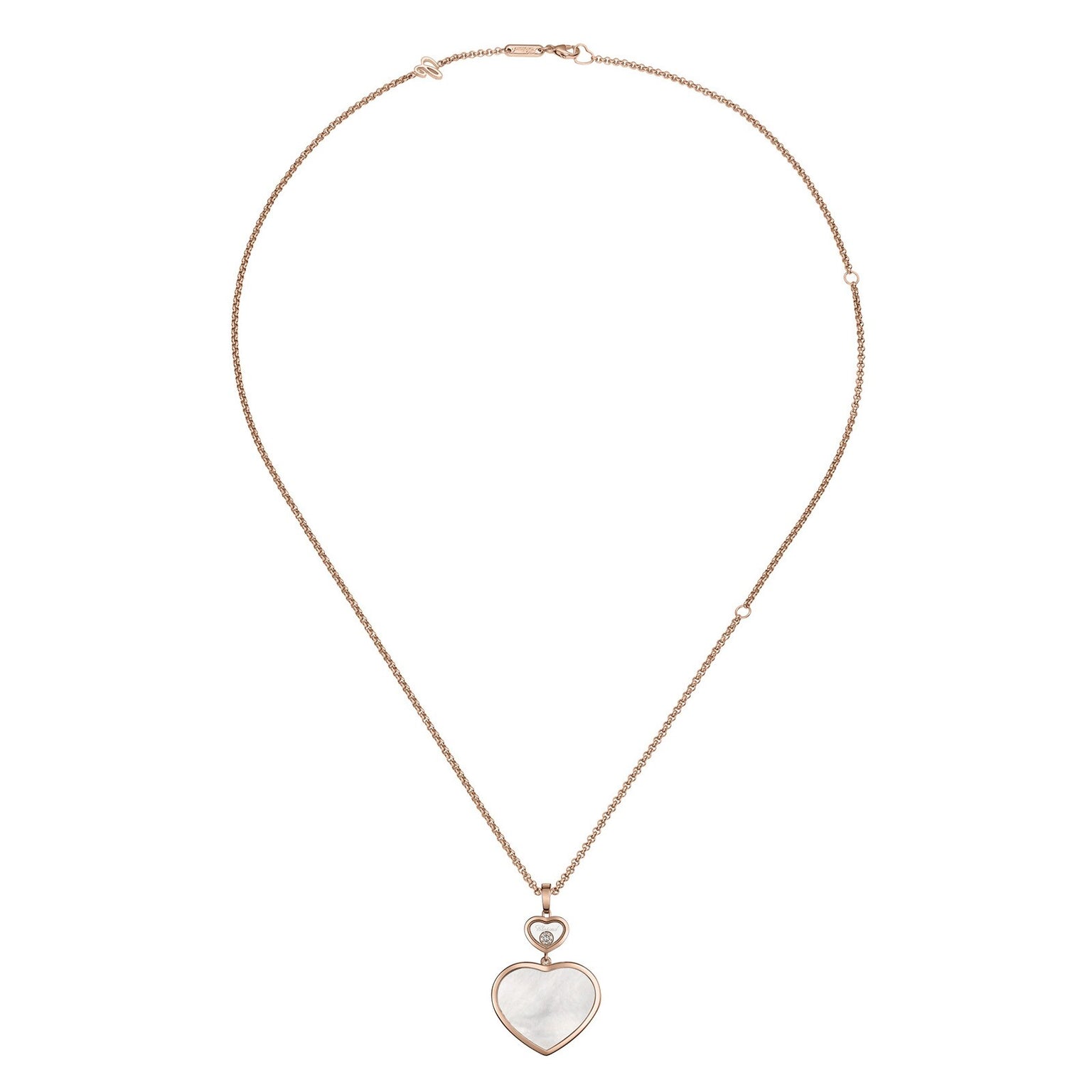 The Chopard Happy Hearts gold chain necklace features a white mother-of-pearl heart-shaped pendant outlined in gold, elegantly displayed against a plain white background.