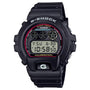 Black Casio G-Shock digital watch with red bezel, LCD display, and black resin band.