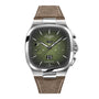 The Glashütte Original Seventies Chronograph Panorama Date features a green gradient square dial with two subdials, shark tooth scale, date at 6 oclock, sporty steel tonneau case, and a brown suede strap.