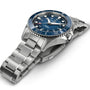 The Hamilton Khaki Navy Scuba Auto showcases a stainless steel case, blue bezel and dial, and a metal link band, elegantly angled on a white background.