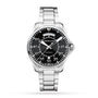 The Hamilton Khaki Aviation Pilot Day Date Auto features a stainless steel case, black dial with white numerals, automatic movement, day and date display, and metal link bracelet, shown against a white background.