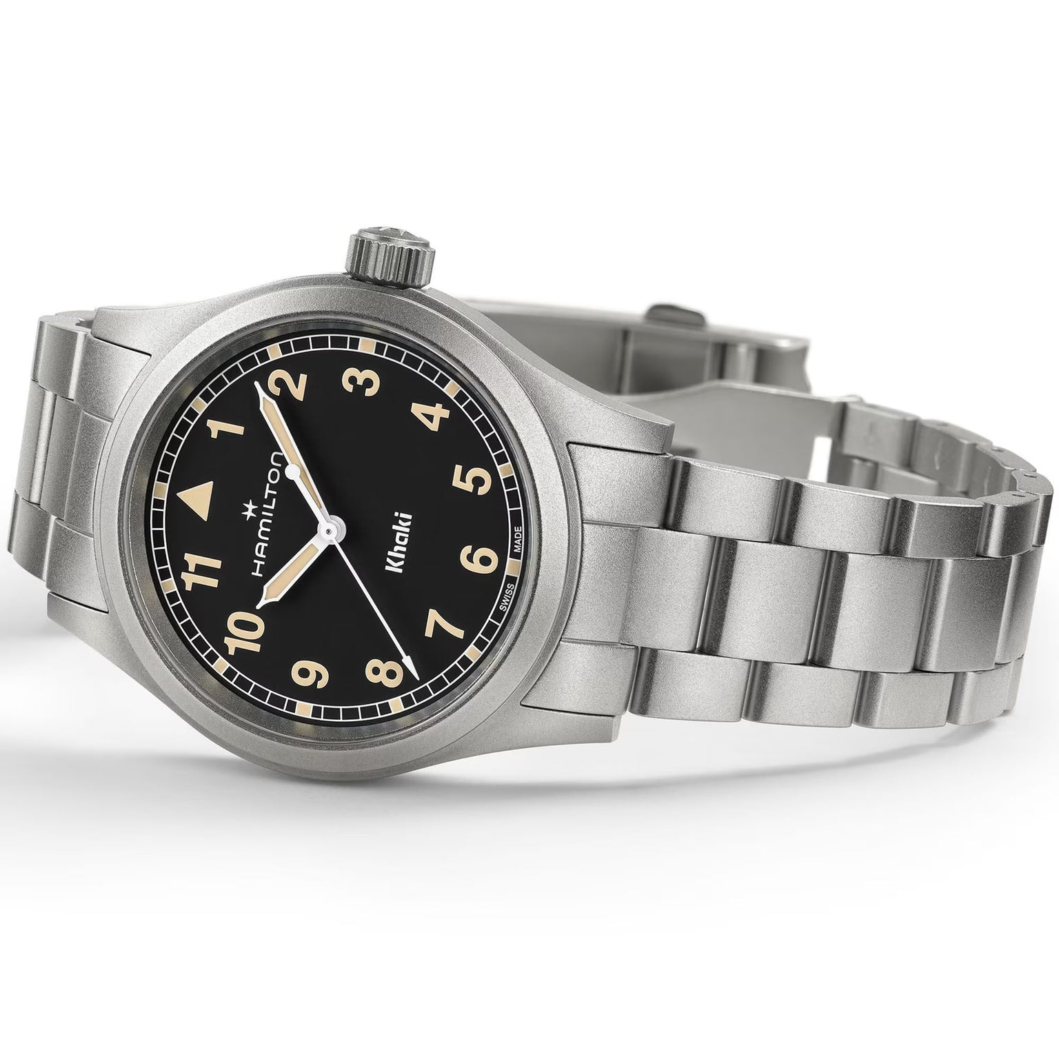 Hamilton Khaki Field Quartz 38mm wristwatch with a black dial, cream numerals, and a metal link band, shown at an angle.