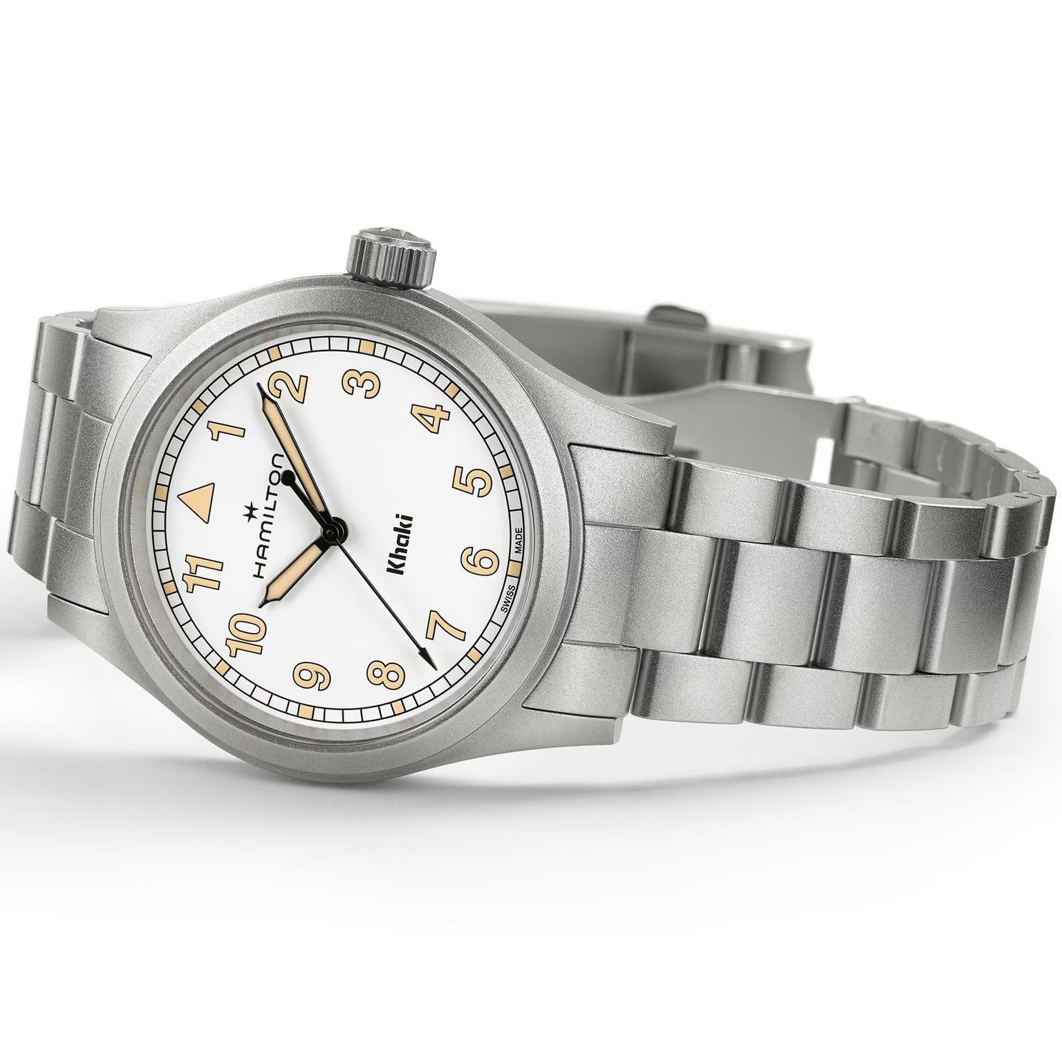 The Hamilton Khaki Field Quartz 33mm wristwatch features a white dial with gold numerals and a metal link bracelet, displayed at an angle.