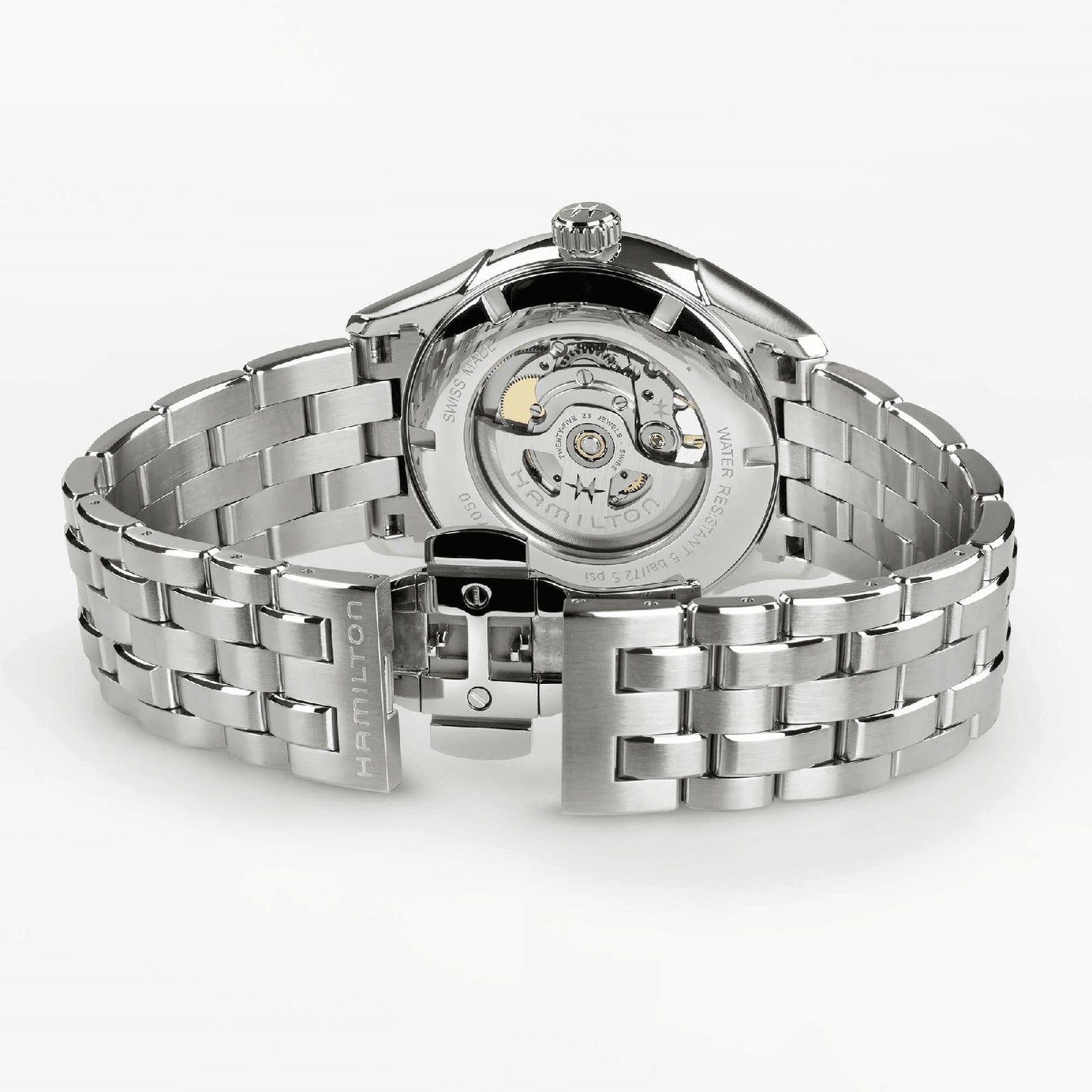 The Hamilton Jazzmaster Open Heart Auto 42mm features a stainless steel case, open clasp, and transparent case back that reveals its automatic movement—a stylish dress watch for those who admire elegant craftsmanship.