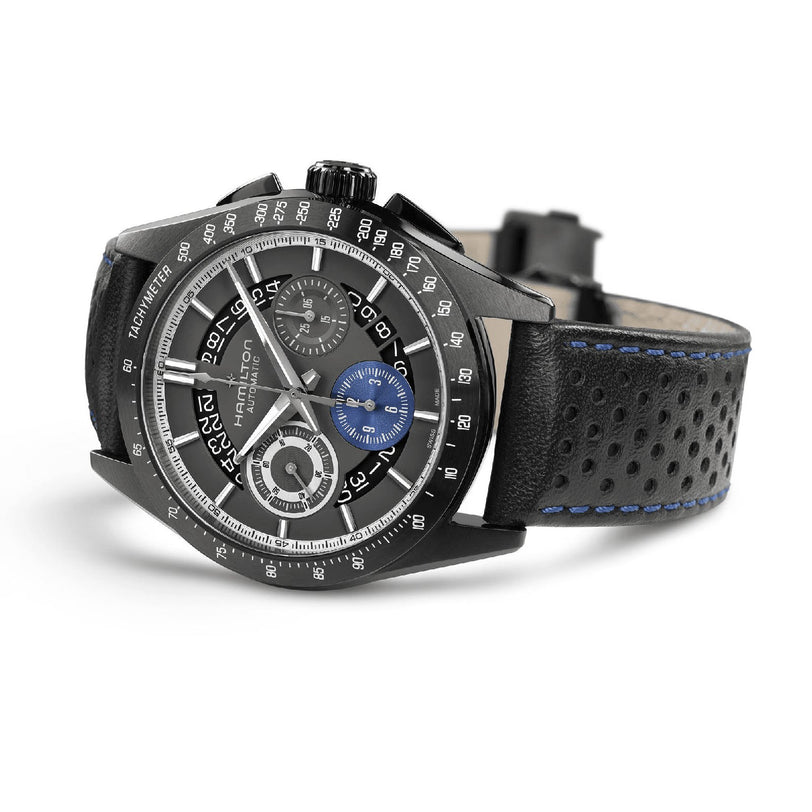 The Hamilton Jazzmaster Performer Autochrono 42mm impresses with black and silver tones, blue-stitched perforated leather strap, chronograph counters, subdials, and a modern tachymeter bezel.