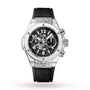 The Hublot Big Bang Unico Sapphire features a transparent case, black rubber strap, visible chronograph movement with three subdials, and silver push buttons on the right side.