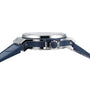 Side view of the Hublot Big Bang Steel Blue Diamonds luxury wristwatch with a blue leather strap and silver case, laying flat on a white background.
