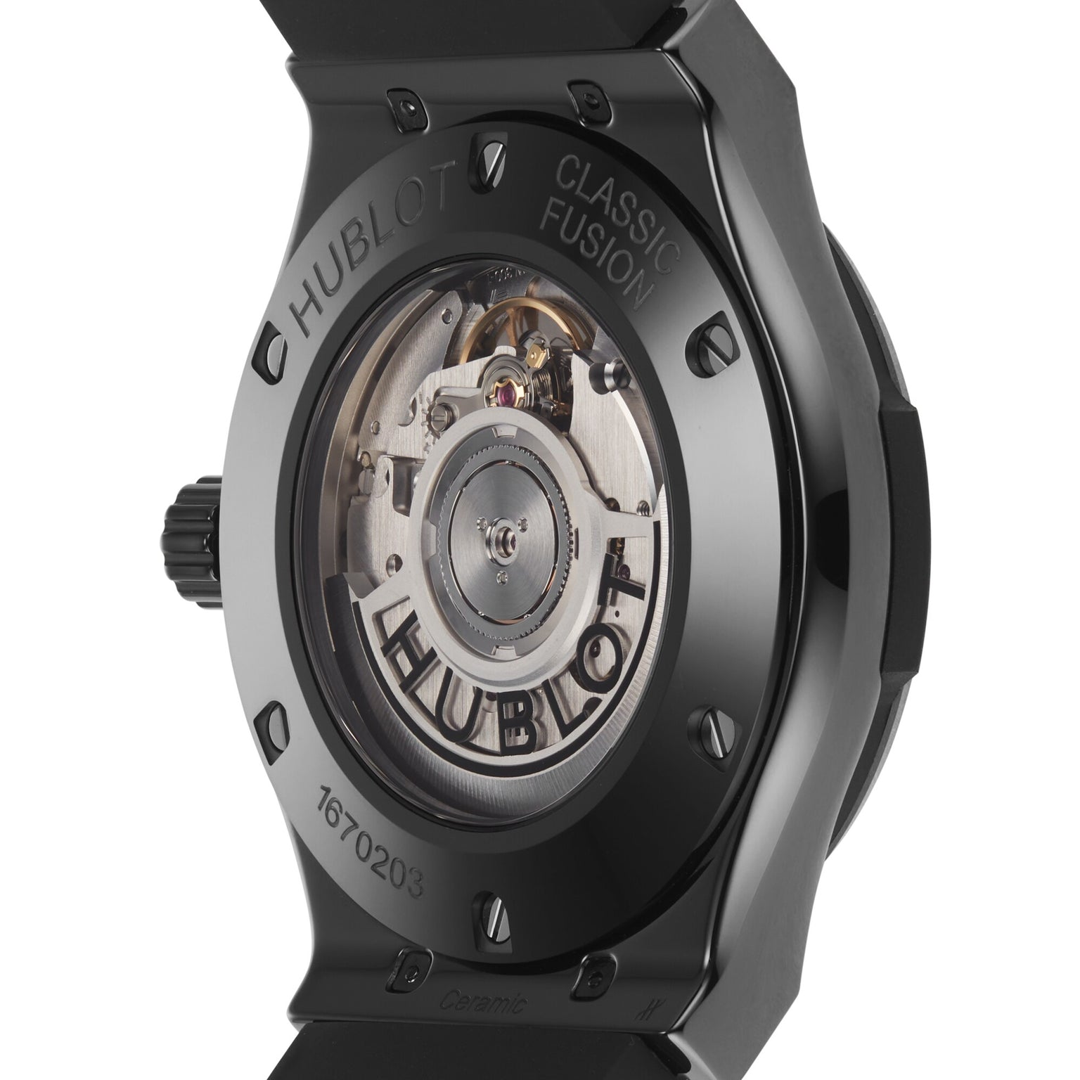 Close-up of the Hublot Classic Fusion Black Magic watch’s back, showcasing its exposed automatic movement and engraved branding, all set in sleek black high-tech ceramic.