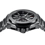 A close-up of the Hublot Big Bang Integrated Titanium shows its skeleton dial, visible gears, bold self-winding chronograph, and brushed metal bracelet—all inspired by the Big Bang Unico design—against a white background.
