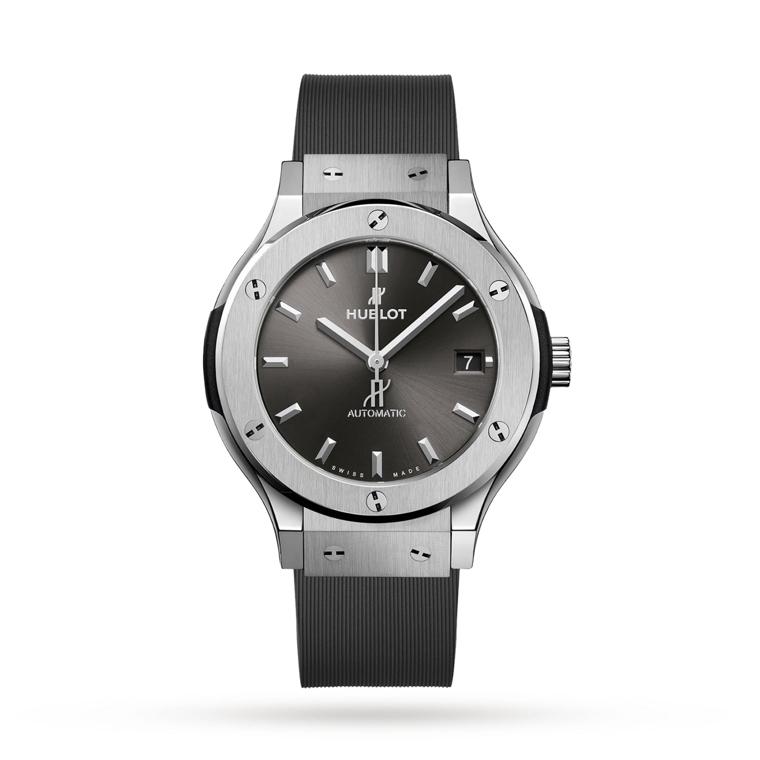 The Hublot Classic Fusion Racing Grey Titanium features a titanium case, grey dial, black rubber strap, metallic hour markers on white, and a date display at 3 oclock.