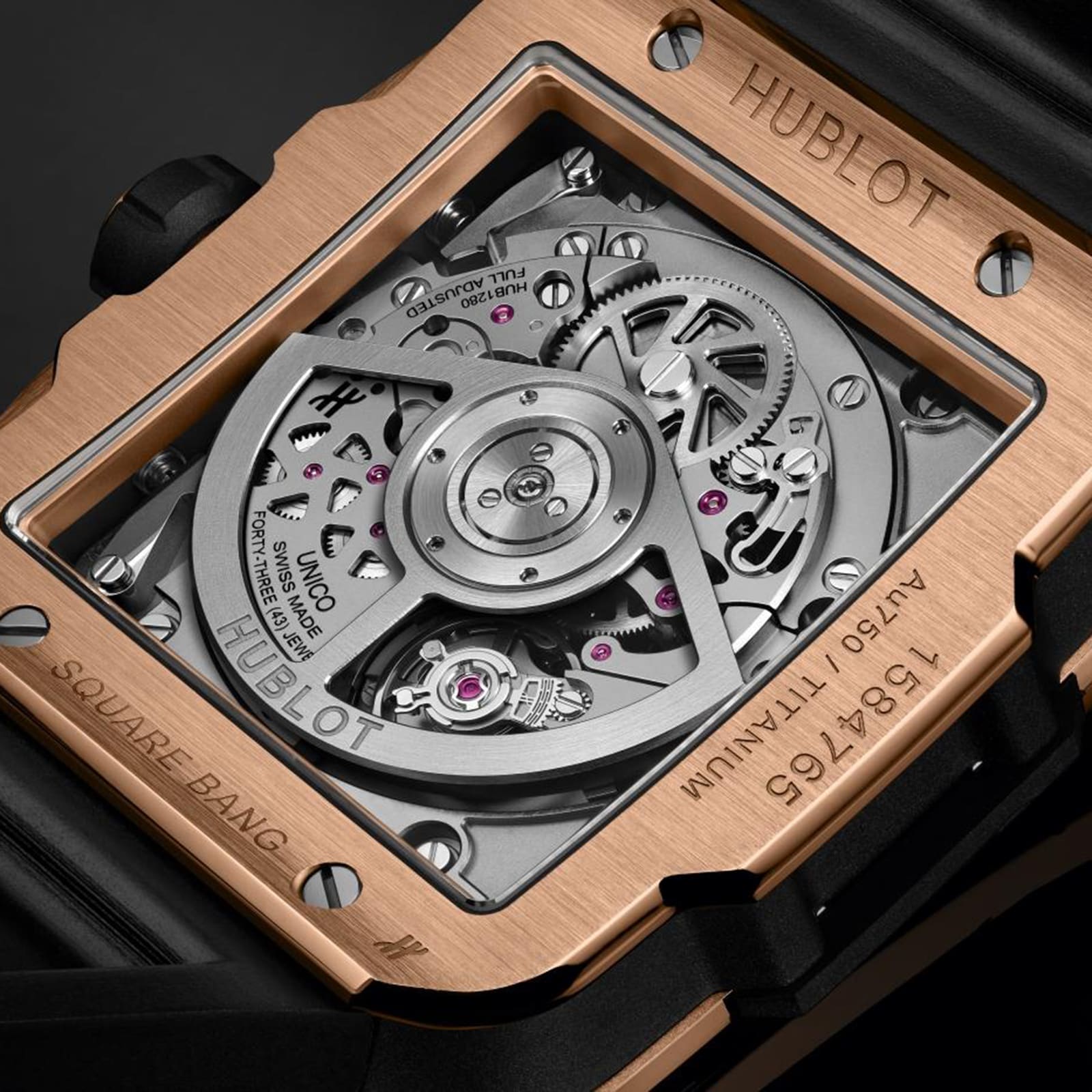 Close-up of the Hublot Square Bang Unico King Gold Ceramic’s back, showcasing its transparent case, intricate HUB1280 UNICO movement, and detailed engravings on an 18K King gold and black ceramic frame.